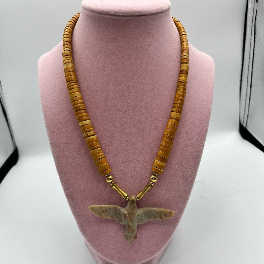 Elegant Gold and Tan Necklace with carved stone Bird Pendant